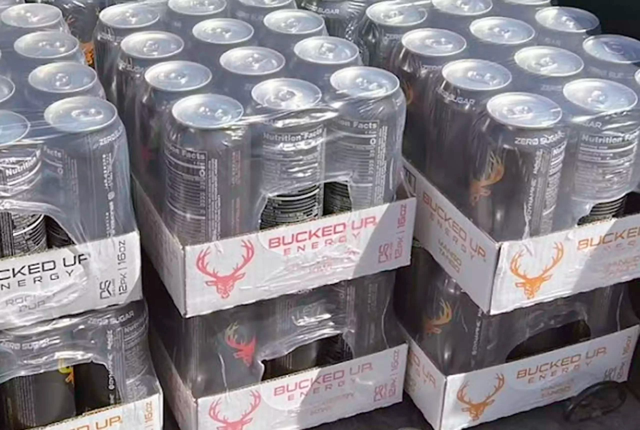 Cases of canned energy drinks prepared for delivery